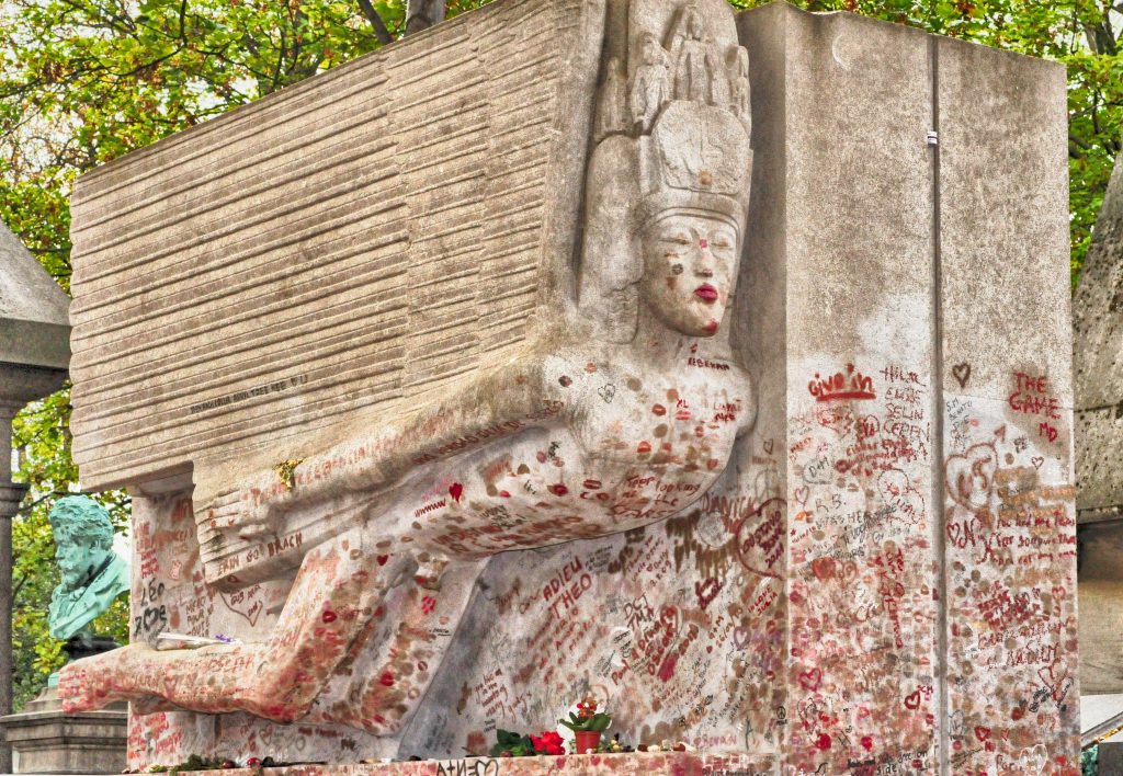 Oscar Wilde's Grave with lipstick kisses on it
